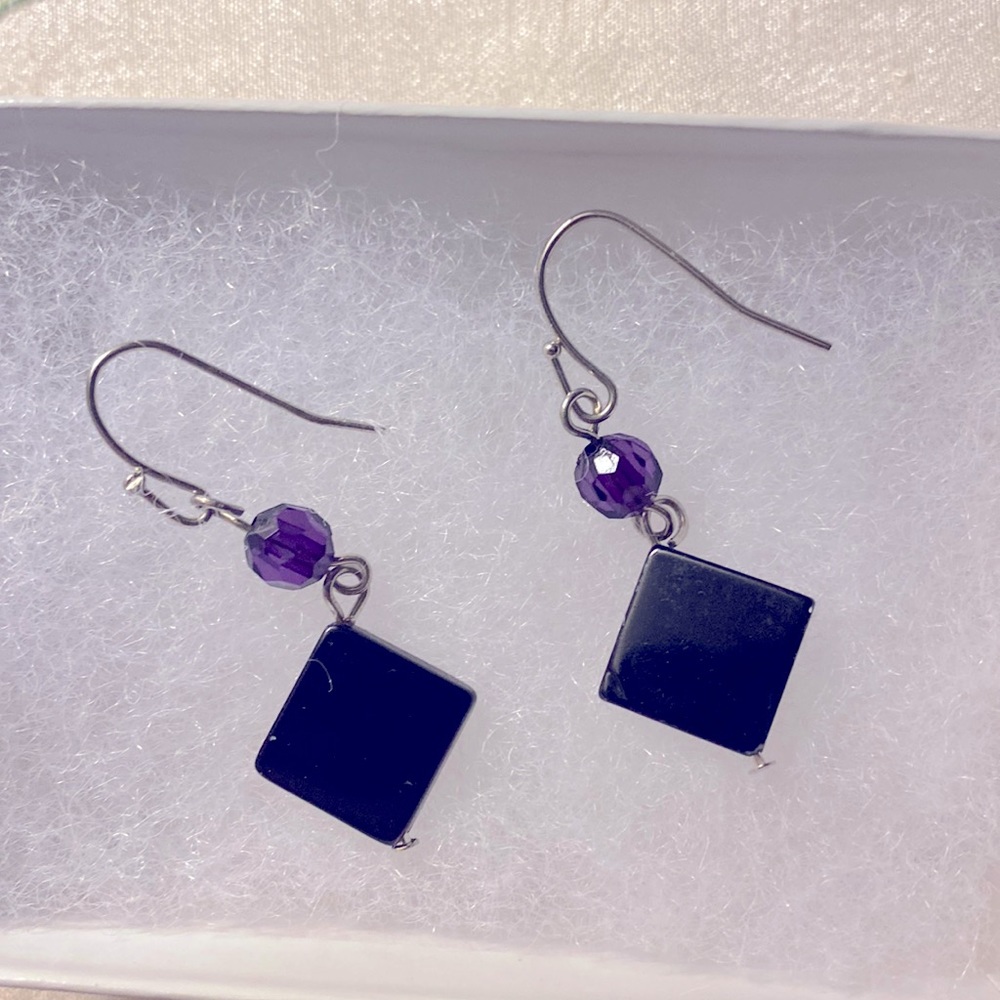 Silver wire dangle earring w/a purple bead and a dark blue square glass bead